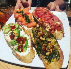 Menu-Uptown_Bruschetta-4-board-plate bruschetta at Rott n' Grapes