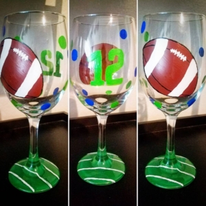 painted wine glasses football theme